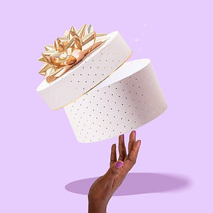 a hand holding a gift