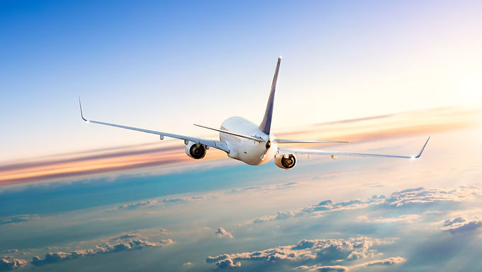 A photograph of a commercial aeroplane in the sky