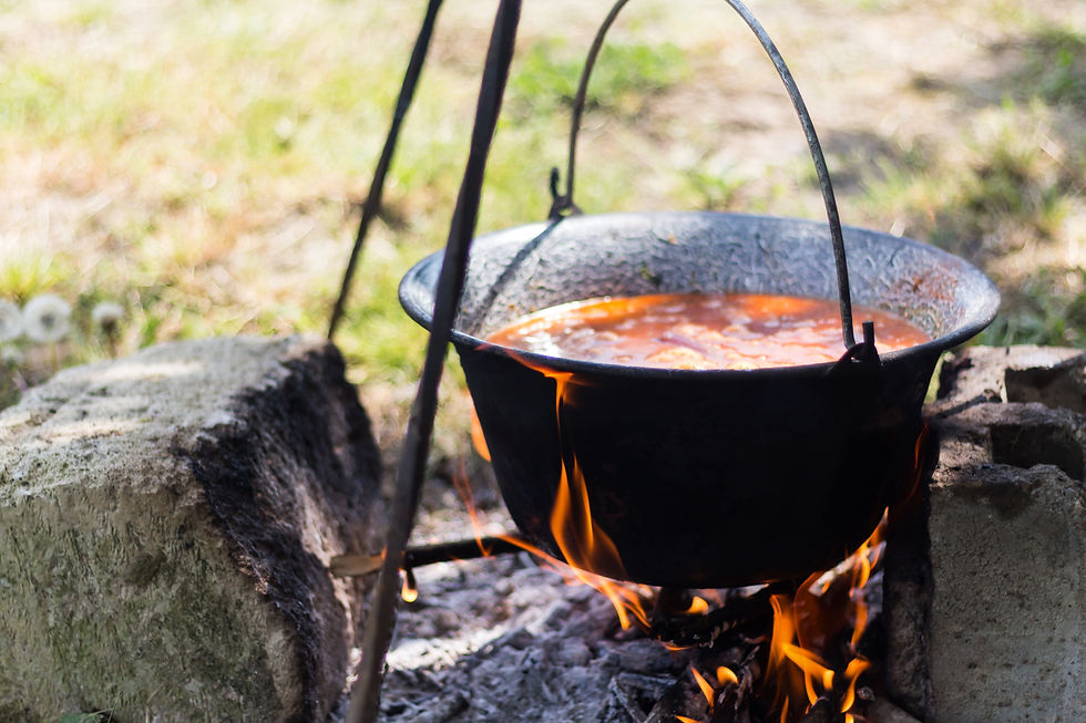 traditional Hungarian bogrács pot over an open fire
