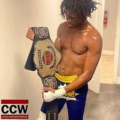 Wrestler Chris Farrow Holds The CCW Cruiserweight Championship In His Hands