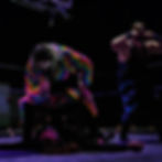 Frank The Clown stands over Skitz