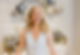 Angelika O'Reilly, Founder of Eliana Curated, smiles beautifully in her vintage jewelry store.