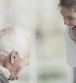 Older man with nurse_edited.jpg