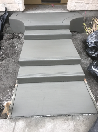 Fleshly completed concrete steps.