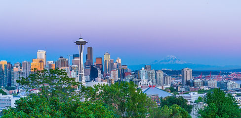 Seattle skyline with Mount Rainier in the background during sunset.jpg
