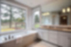 Style Line tan interior horizontal slider with picture window combination and single hung