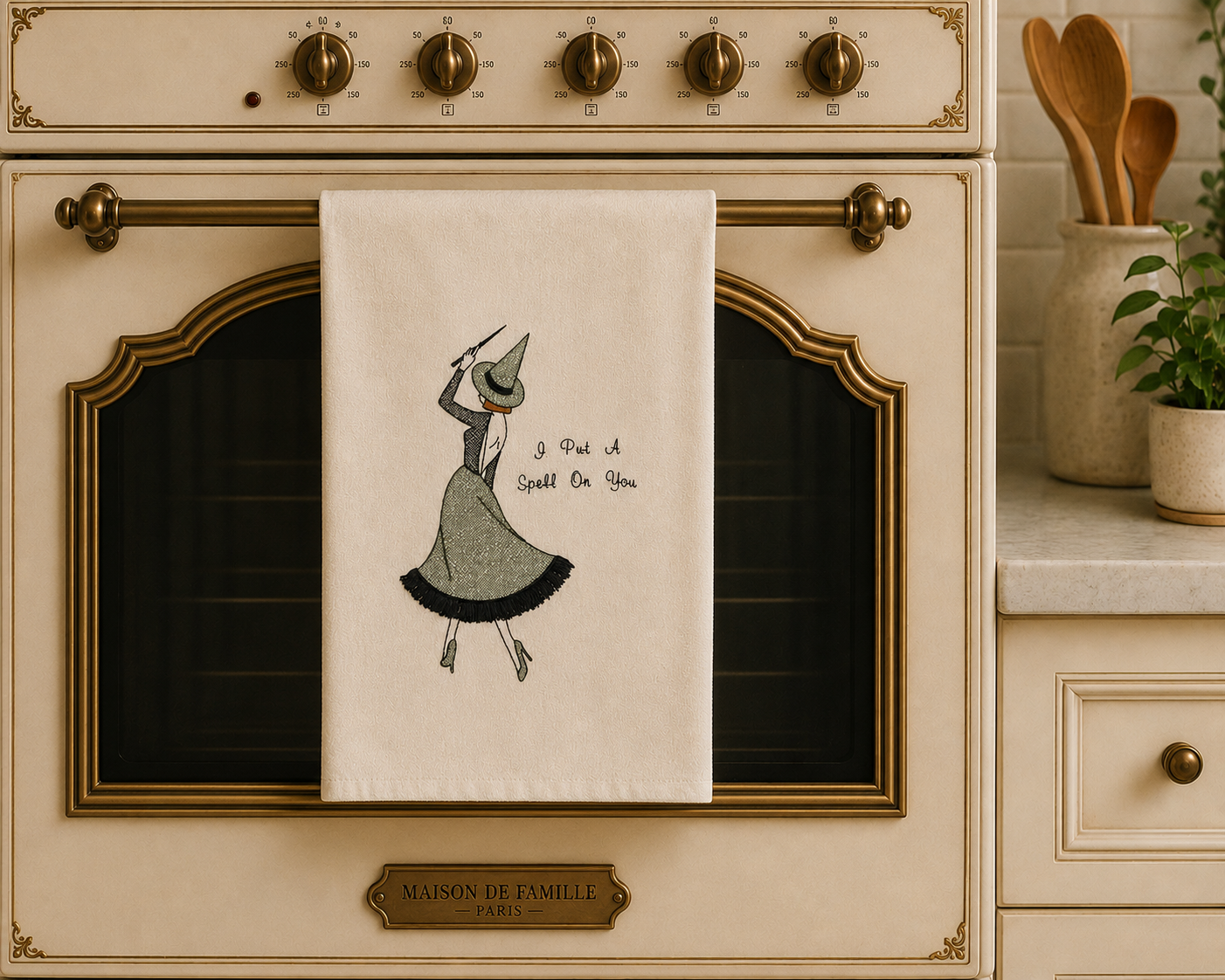 Halloween Embroidered kitchen towel featuring vintage witch with wand and caption"I put a spell on you"