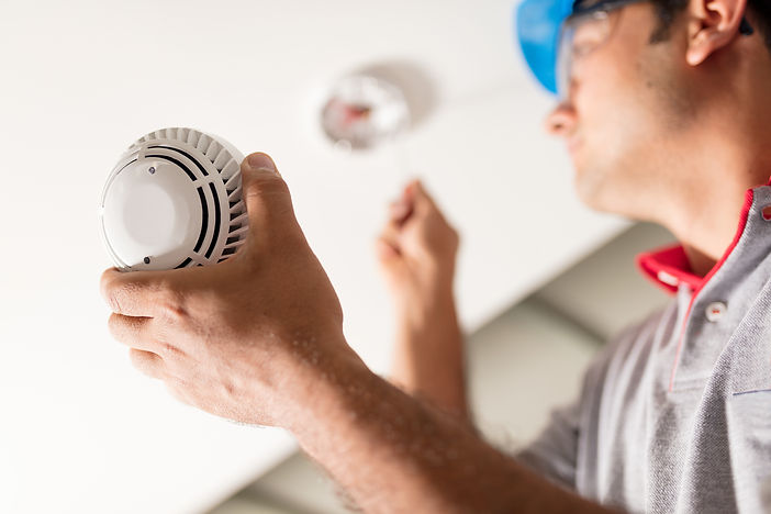 Maintenance of Smoke Alarm - paid for istock image.jpg