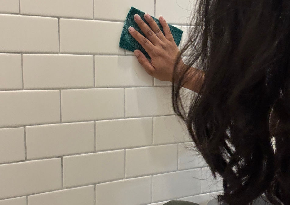 Scrubbing bathroom shower