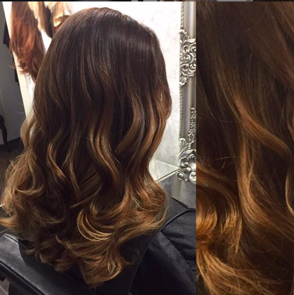 warm brunette balayage with golden copper caramel and toffee tones created by colour hair experts