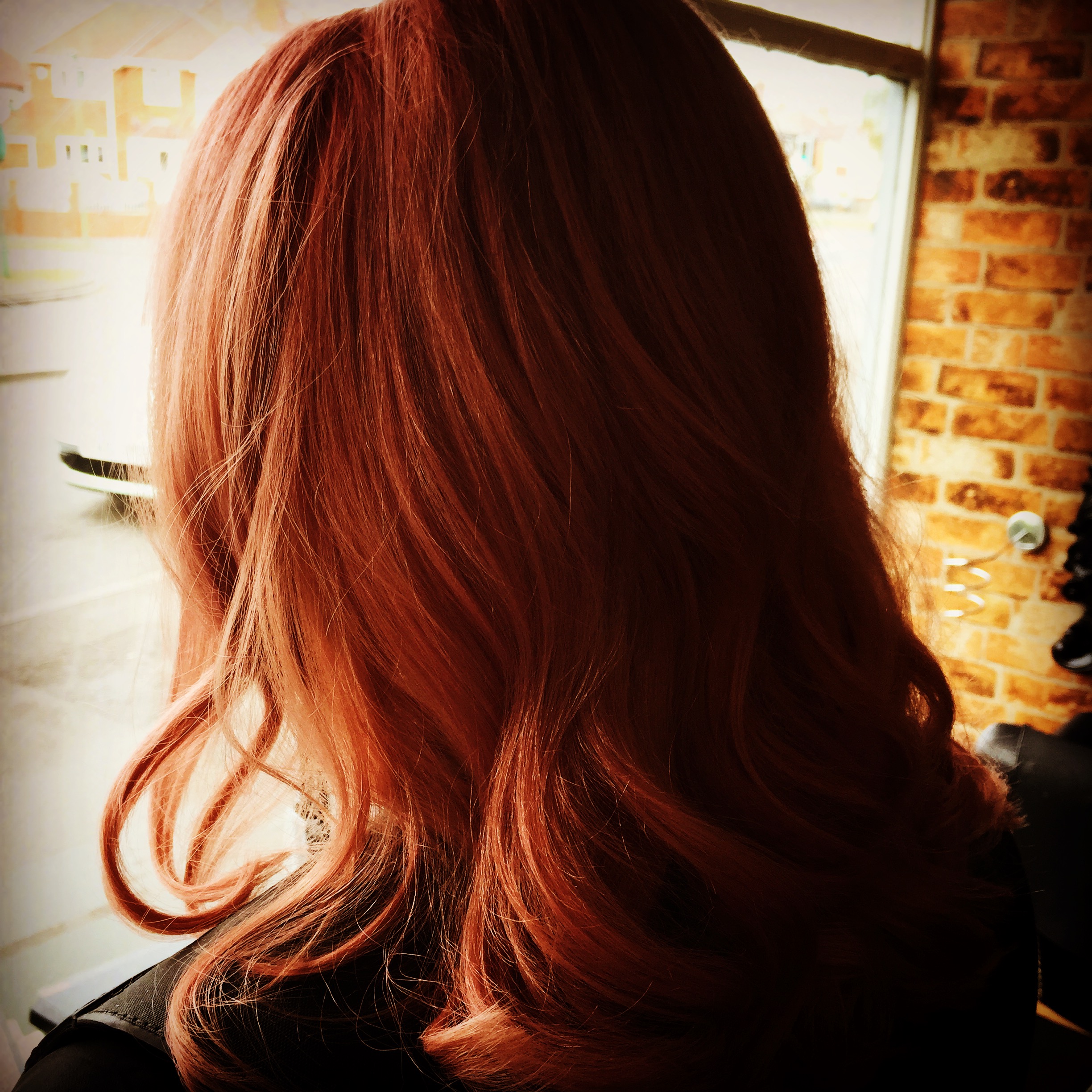 copper hair colour done by hair experts in professional hair salon