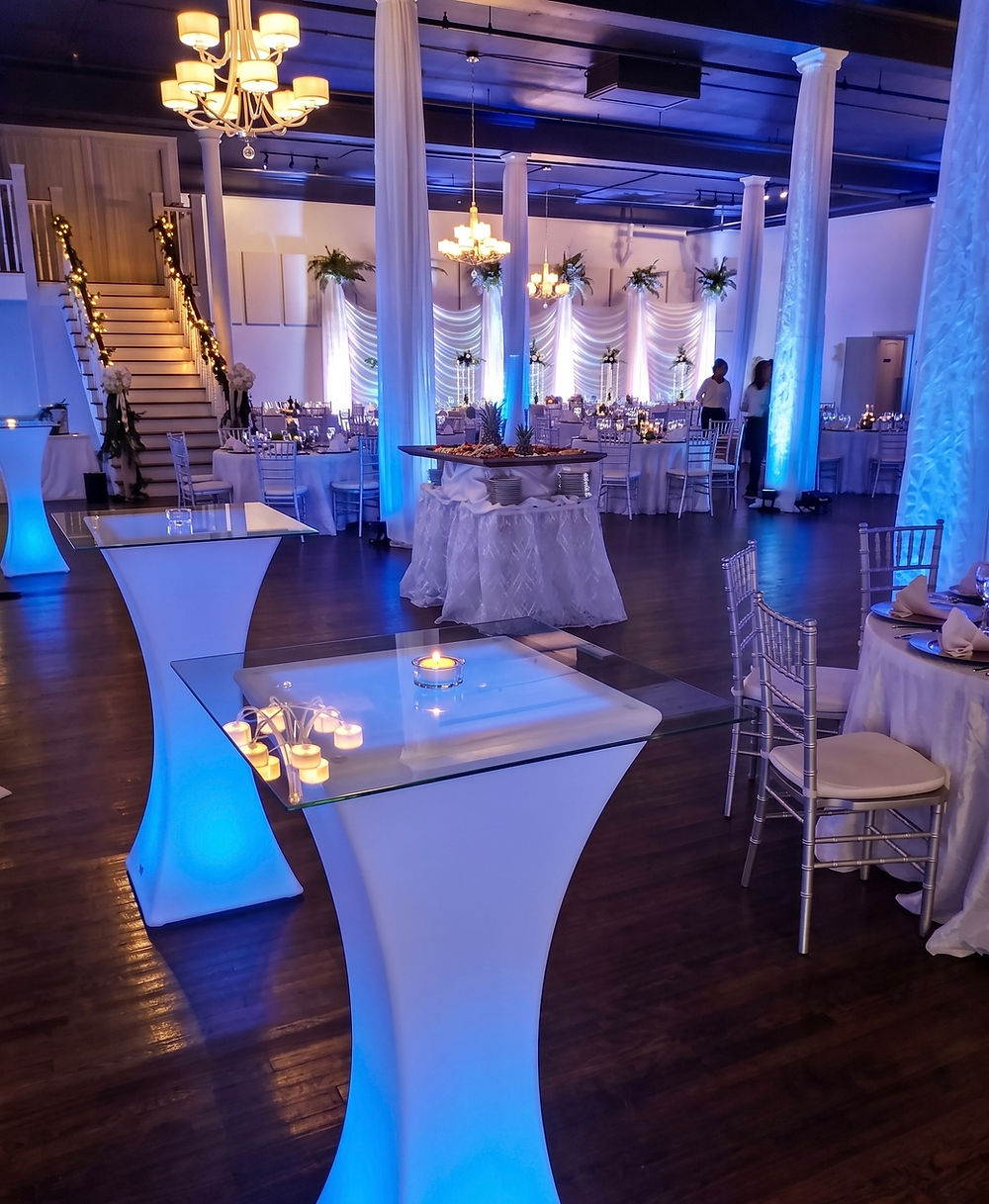 Tall tables set up at an event done by Stellar Events.