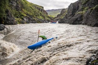 Actions hots taken from a kayak, for Viking Rafting Iceland.