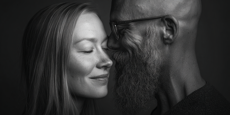 A man and woman showing their emotional attachment to each other.