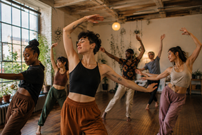 A group of people expressing themselves through creative dance