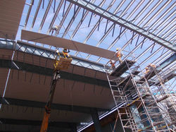 Using Scaffolds for roofing work with wheels in rails for fast movement 1