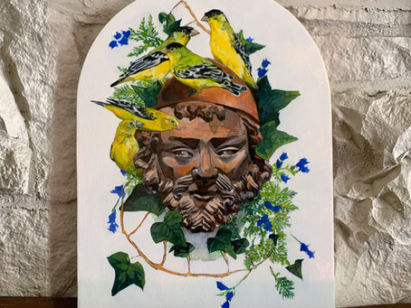 a limestone sculpture of St Joseph with five lesser goldfinches and ivy and cedar leaves