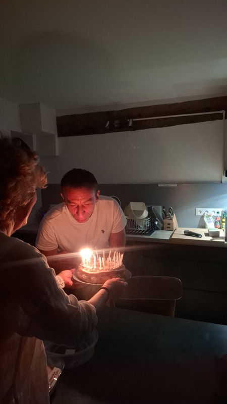 Vassilis blows out his candles the day before the race with a big cake, just the way he likes them.