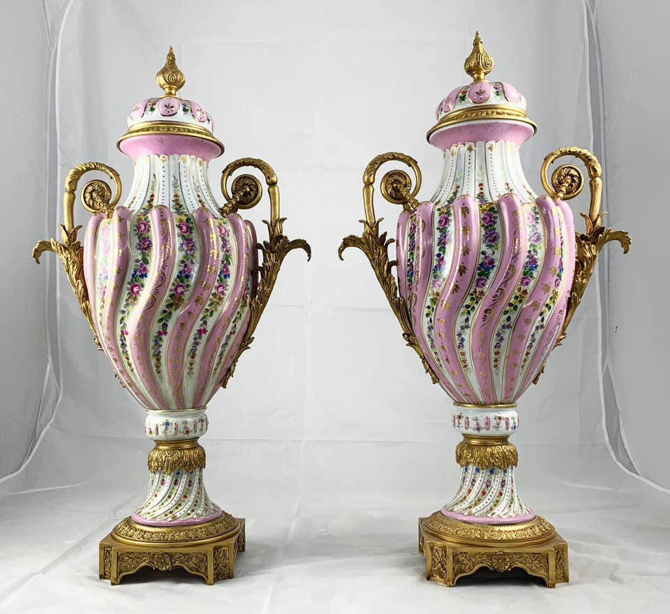 Thumbnail: 20th Century Pair of Ormolu Mounted Pink Sevres Vases with Lids