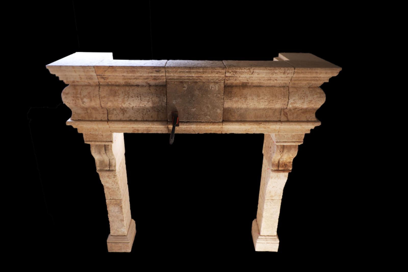 20th Century French Limestone Fireplace with Stacked Molding and Sculpted Jambs