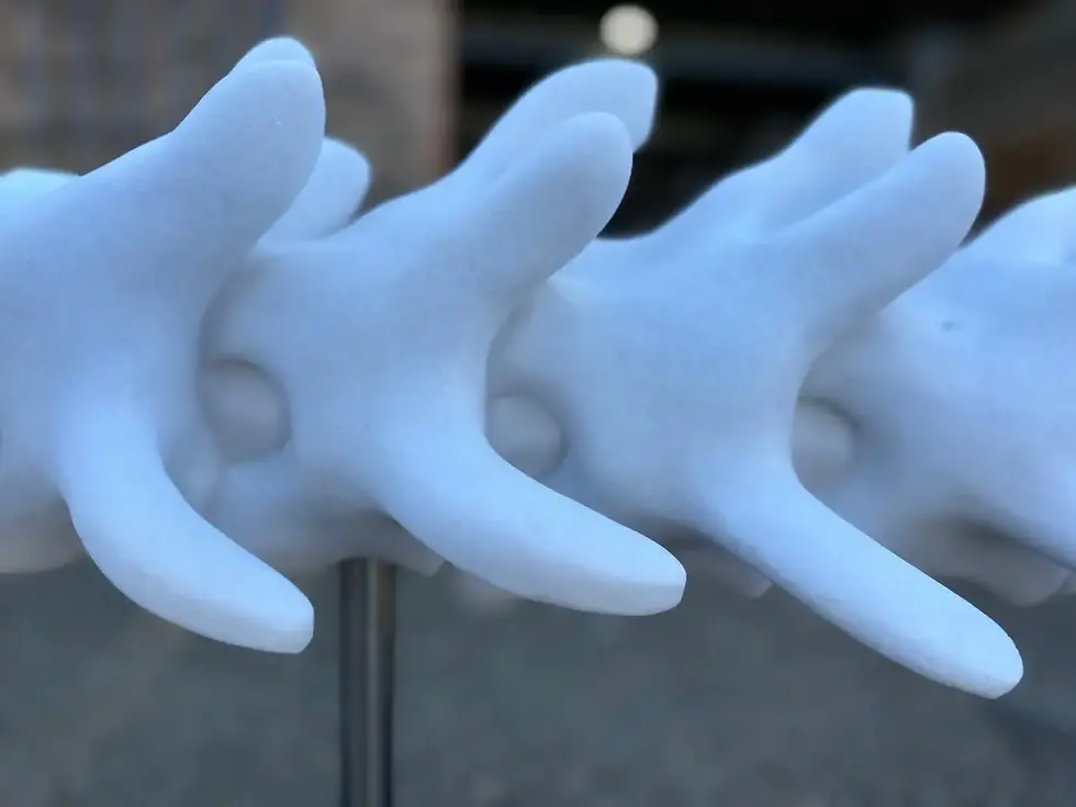 Thumbnail: Hand-Carved Marble Vertebrae Sculpture on Marble Base