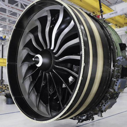 Today, pressed materials remain central to U.S. manufacturing and innovation. For example, the GE9X jet engine (shown above) is the first jet engine utilizing 3D printed parts to receive FAA approval. The engine is 10% more fuel-efficient than its predecessor due to 3D printed parts and other technologies. (image GE Aerospace)