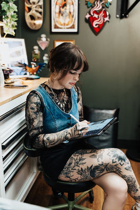 Branding portraits of tattoo artist Kathryn Semus at Moss Tattoo Studio in Ogden featuring editorial photography and tattoo culture aesthetic.