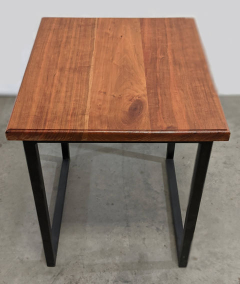 Natural cherry wood side table with routed edges