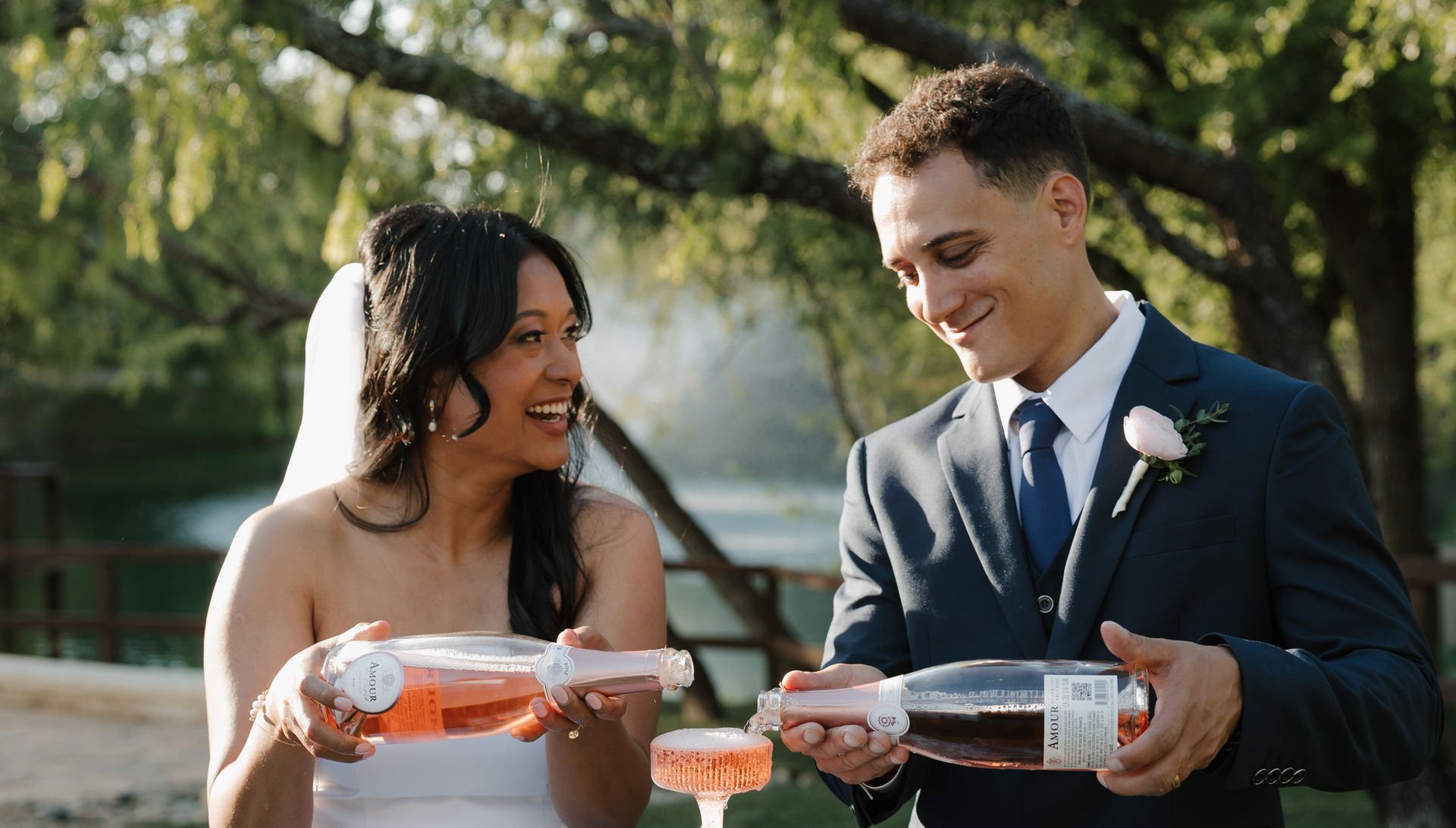 Champagne toast during an outdoor garden wedding celebration at Willow Woods Barn & Studio, designed by Lasting Events DFW.