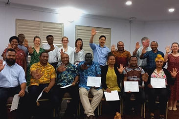 Module 3 whole cohort doing Stop TB sign.jpeg