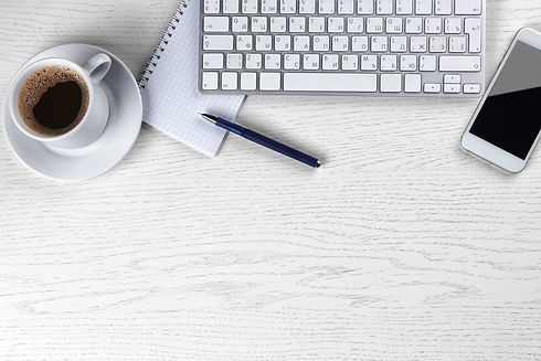 Workplace with cup of coffee and keyboar