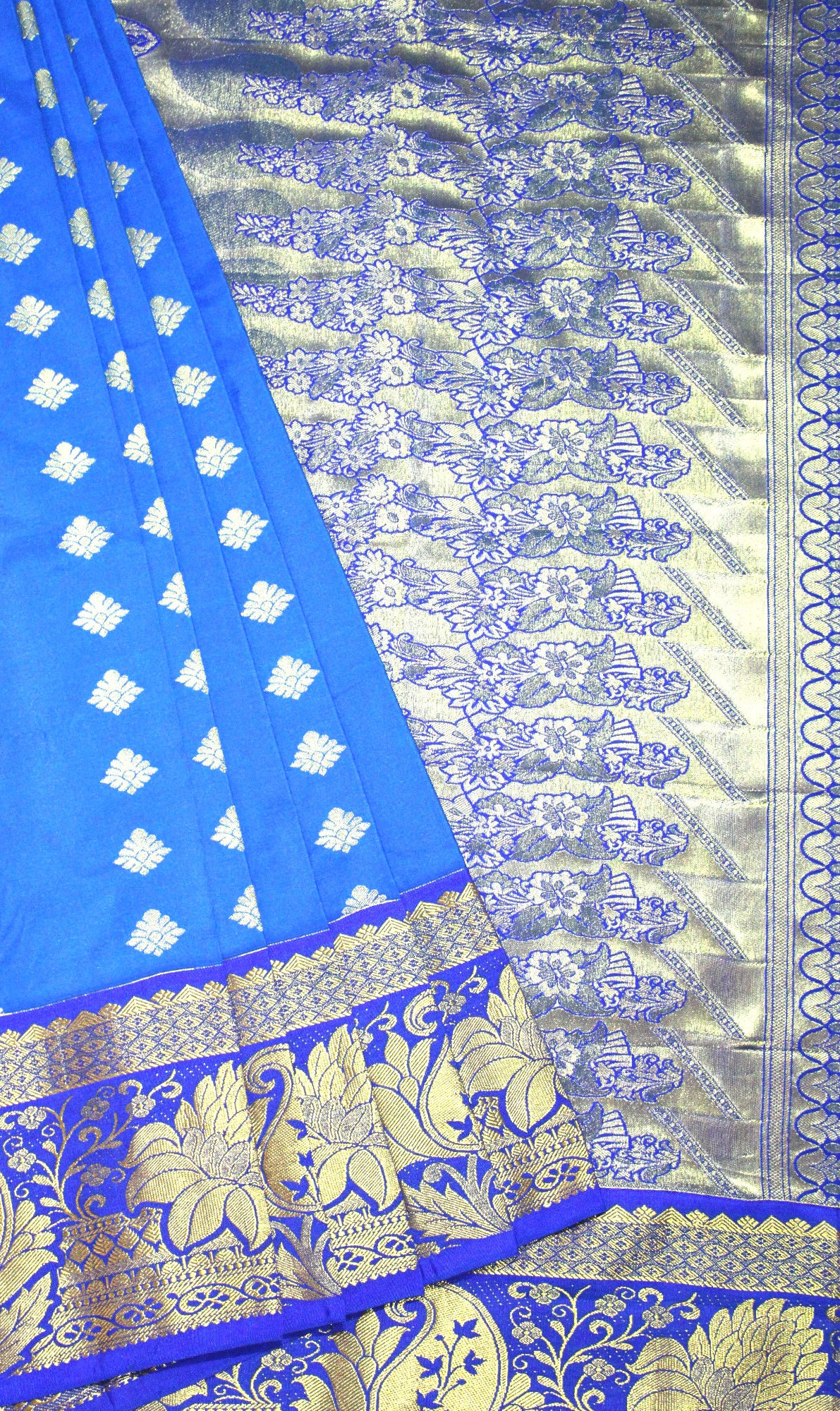 Blue silk saree with small butta allover with Beautiful floral border