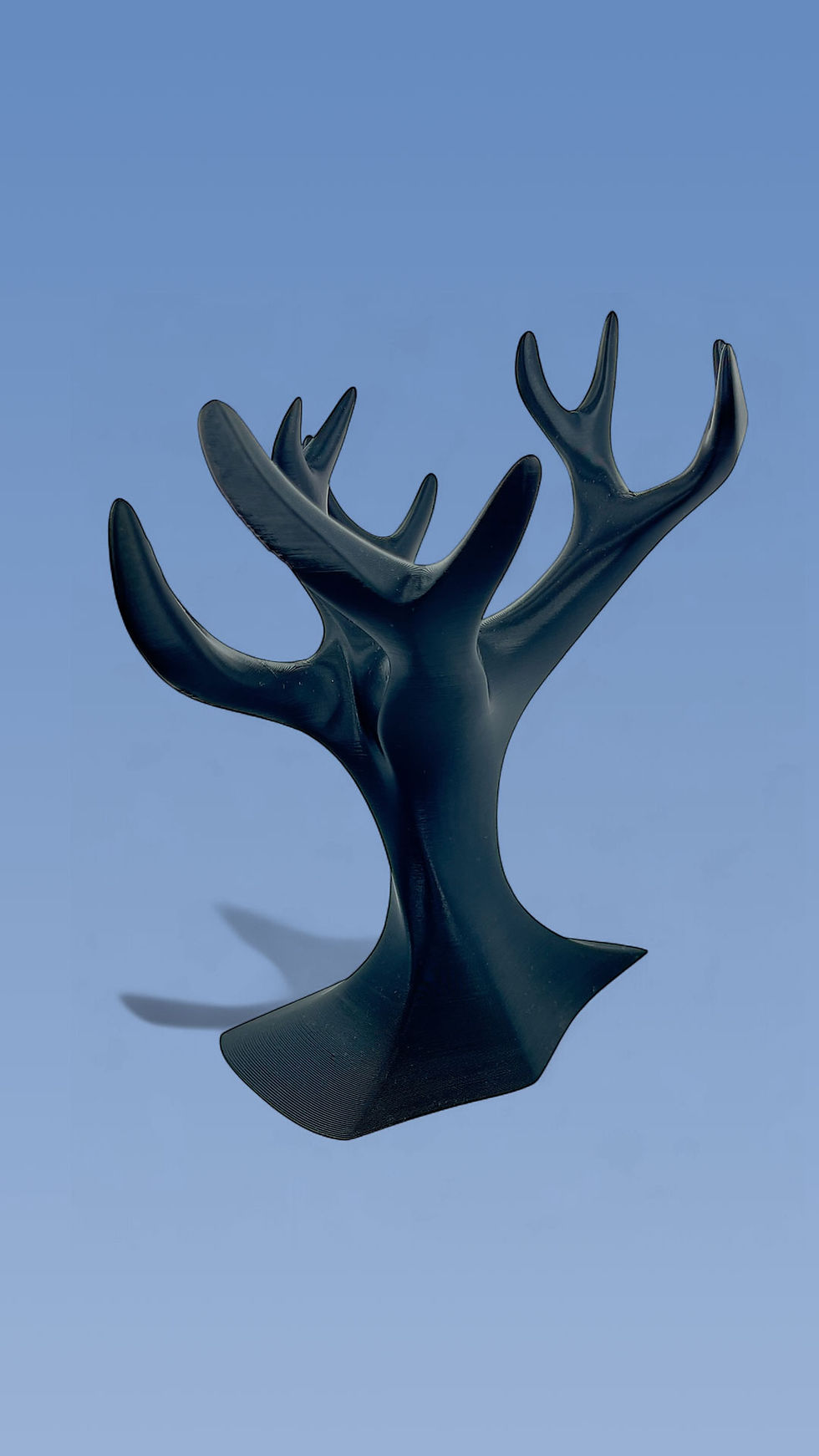 Modern jewelry organizer with multiple branches for rings and chains