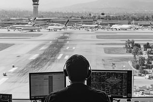 air-traffic-controller-managing-flights-airport-control-tower_edited.jpg