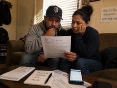 A concerned couple in Modesto reviews a "Notice of Action" letter, contemplating the impact of moving in together on their Medi-Cal, CalFresh, and SSI benefits, while seeking resources for guidance.