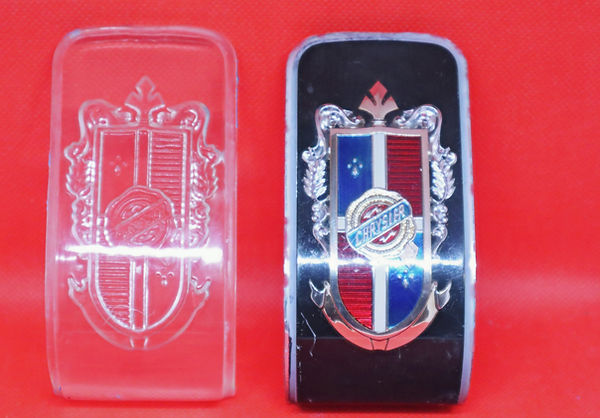 1954 Chrysler Trunk badge and replica