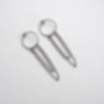 Silver earrings, geometrical forms with chains, minimalist design, fashion accessories.