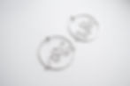 Silver earrings, geometrical forms, minimalist design, fashion accessories.