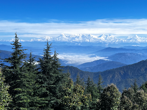 a 1panaromic view of Kumaon Himalayas on a clear sky day, from this boutique stay in mukteshwar