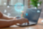 a laptop with icons signifying cyber security managed services
