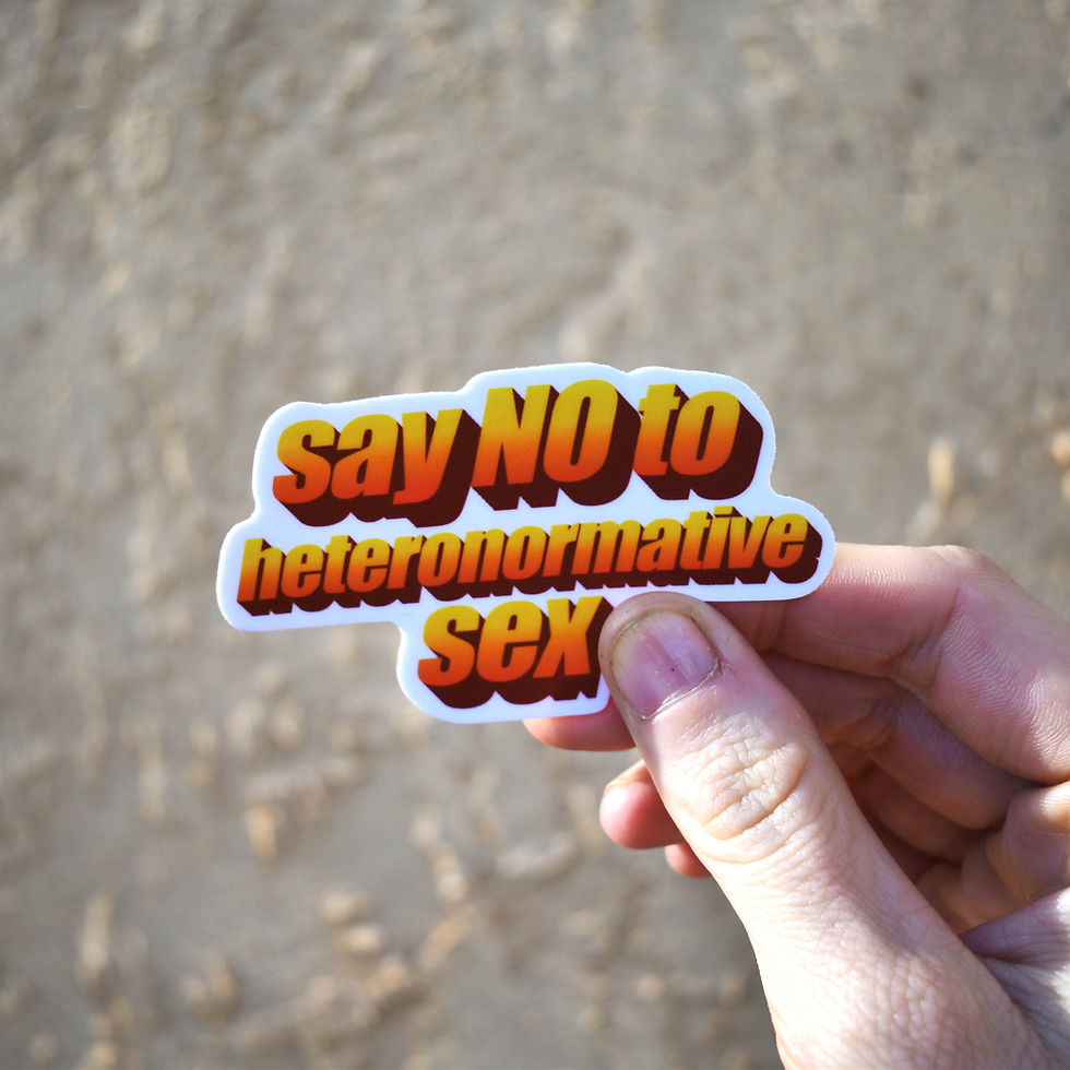 A die-cut sticker with orange 3D WordArt-style text across three lines with a white border.