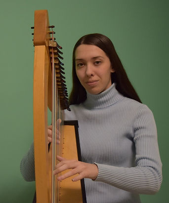Eileen C.K. Shafer, CCM at the harp for a Therapeutic Music session