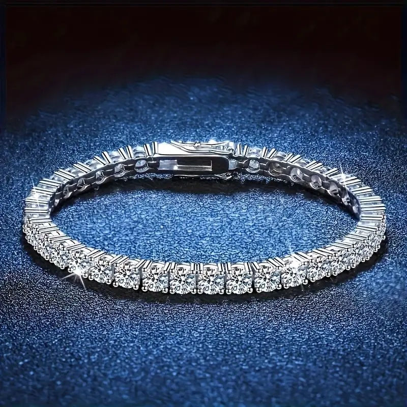 Platinum-plated sterling silver tennis bracelet styled for an elegant evening look