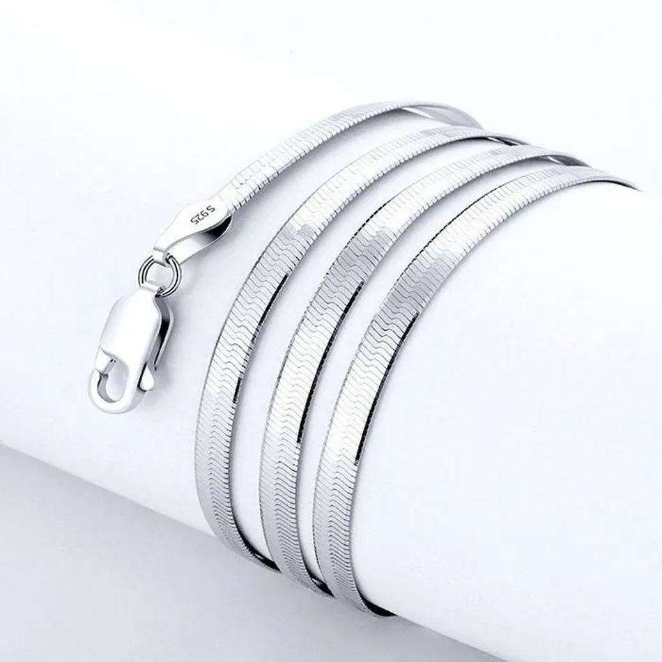 Thumbnail: Close-up view of the flat liquid-metal blade links and mirror-polished sterling silver finish