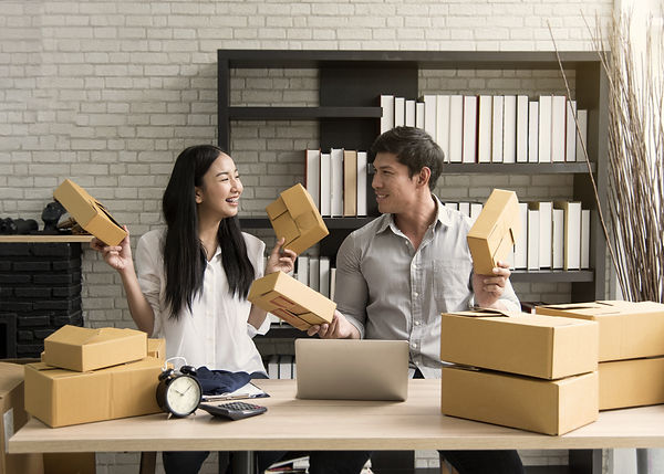 Man and woman handling orders