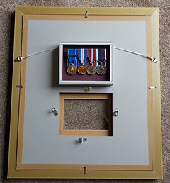 Removable medal box in memorabilia frame