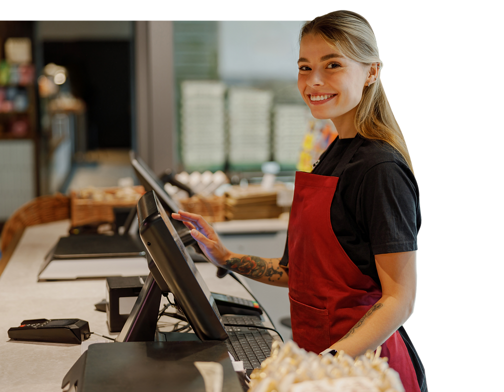 smiling-barista-cafe-counter-engaging-with-customers-using-modern-register.png