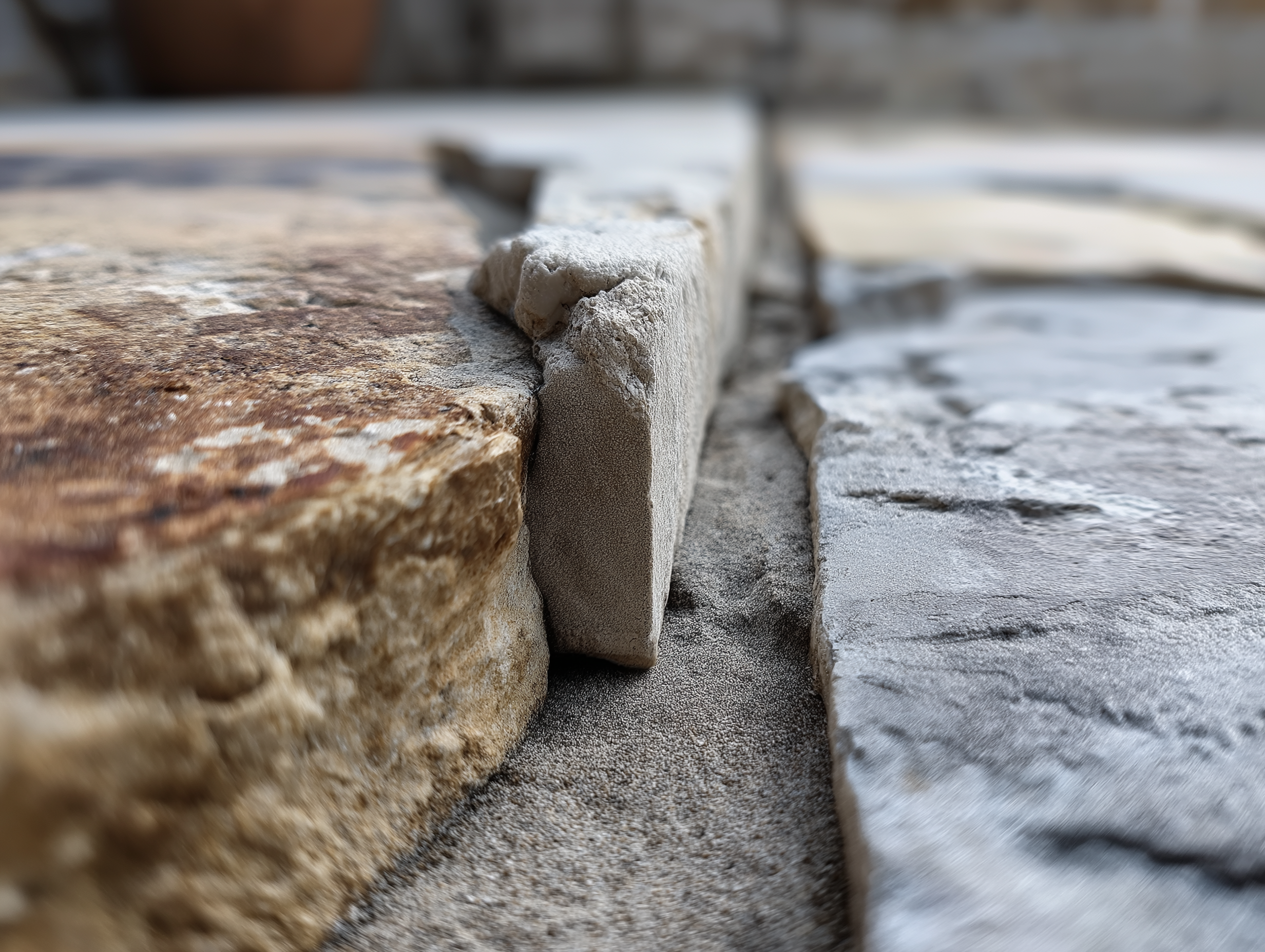 Flagstone repair getting repaired by Monarch Masonry
