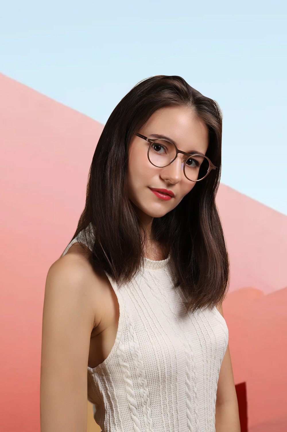 A woman wearing INTHINITI optical glasses