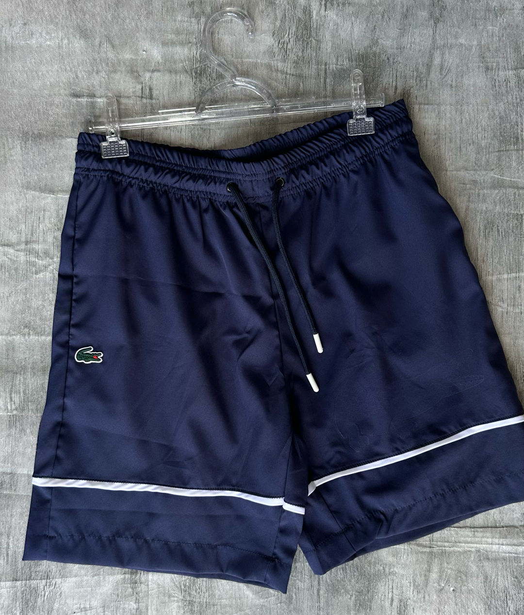 Bermuda Lacoste azul marinho tectel